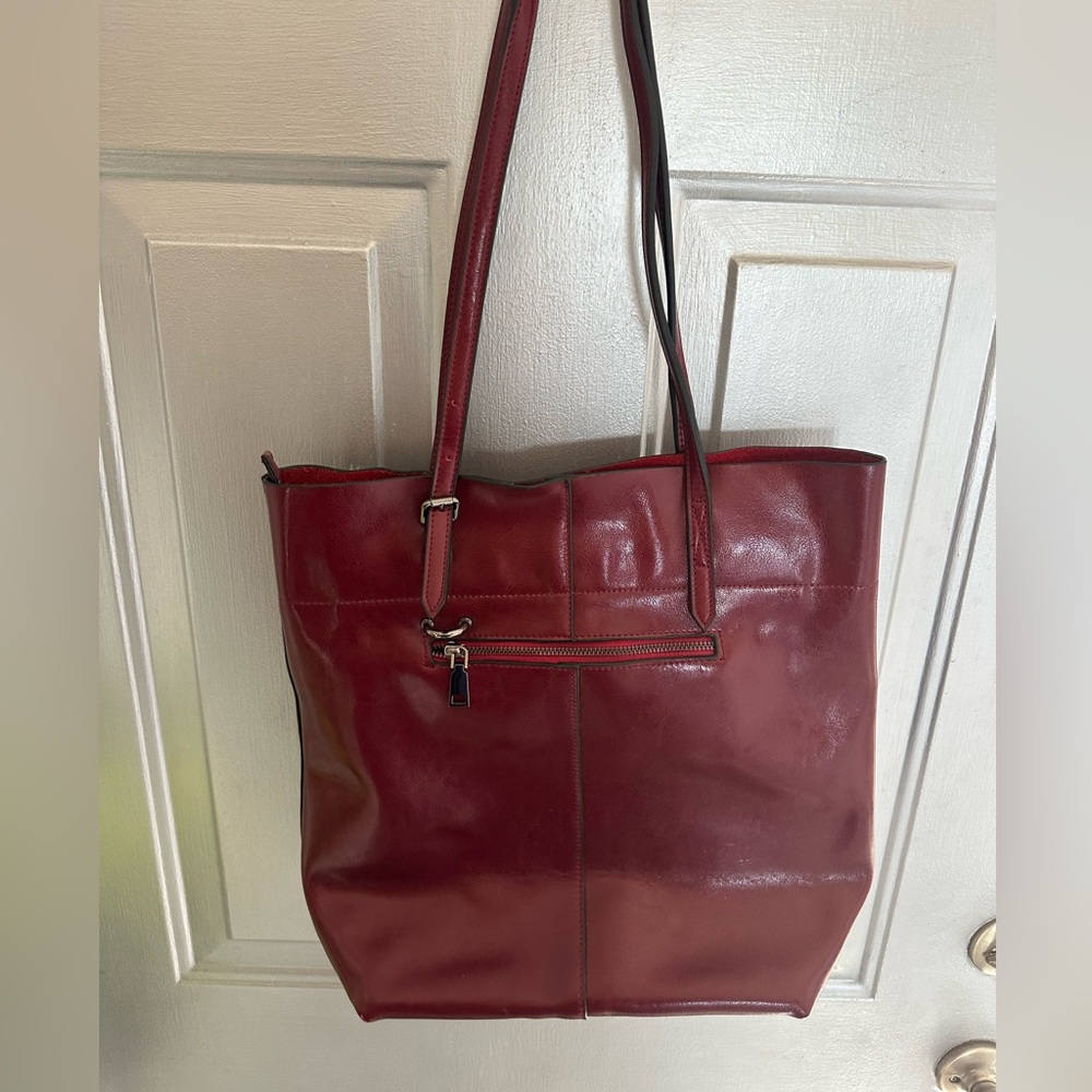 Red leather shoulder bag.